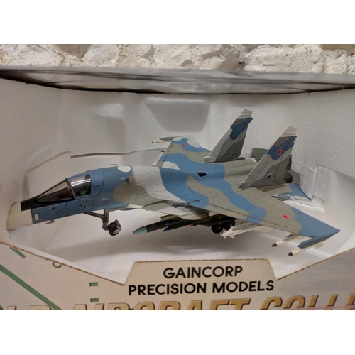 13 - Three Gaincorp precision models from the 'World Aircraft collection' to include a Sukhoi SU-27 Flank... 