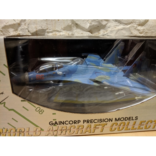 13 - Three Gaincorp precision models from the 'World Aircraft collection' to include a Sukhoi SU-27 Flank... 