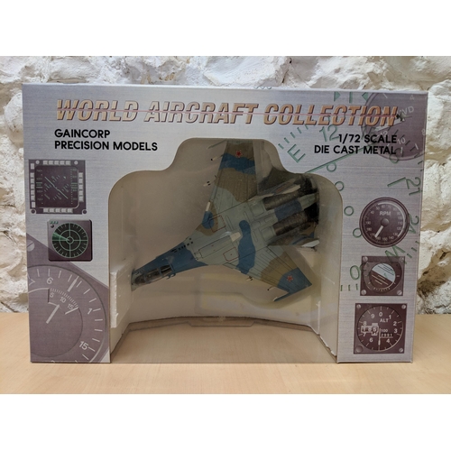 13 - Three Gaincorp precision models from the 'World Aircraft collection' to include a Sukhoi SU-27 Flank... 