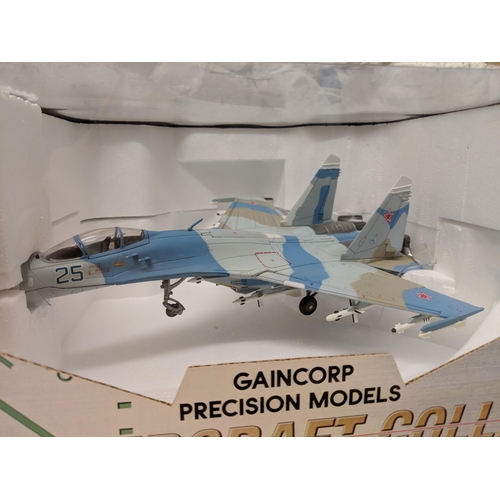 13 - Three Gaincorp precision models from the 'World Aircraft collection' to include a Sukhoi SU-27 Flank... 