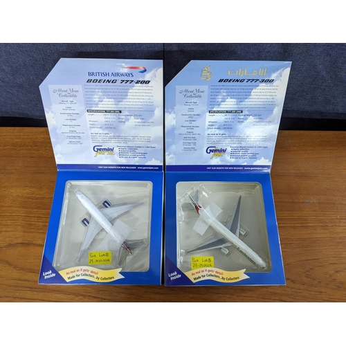 29 - Eight Gemini jets model commercial airline planes all boxed to include; a Boeing 777-300 in a Korean... 