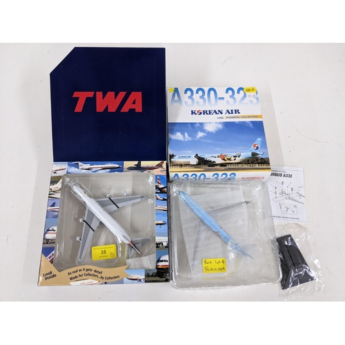 35 - Nine models of commercial aircrafts by Herpa Wings, Dragon wings, Tucano Line and others to include ... 