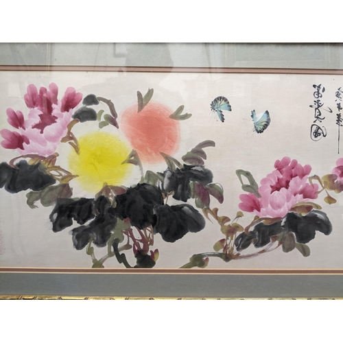 261 - A 20th century Chinese painting of flora signed in a gilt frame, and a Travis watercolour of a Derby... 