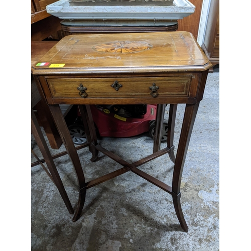 274 - A late 19th century mahogany inlaid side table with canted corner, central oval shell medallion with... 