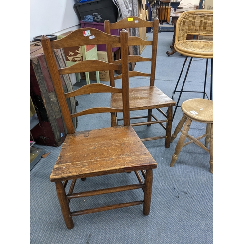 283 - A selection of Georgian and later chairs to include two country ladderbacks, a wicker seated high ch... 