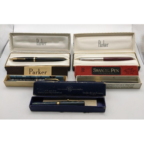 101 - A collection of pens to include three boxed Parker fountain pens, A boxed swan self filling fountain... 