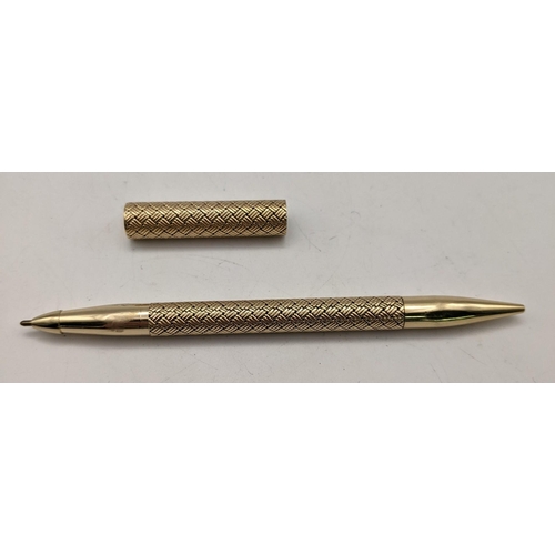 110 - A Tiffany style gold double ended pen & pencil stamped 14ct with hatched pattern weighing 10g
Locati... 