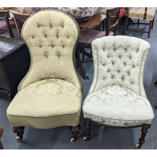 131 - Two Victorian button back upholstered nursing chairs both on mahogany legs with casters
Location: BW... 