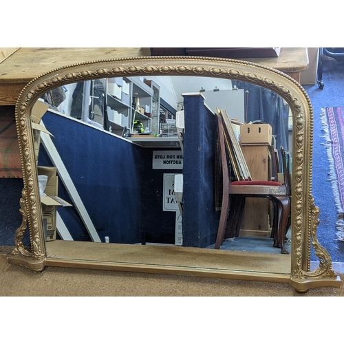 132 - A late Victorian gold painted gilt gesso overmantel mirror, 86cm h x 130cm w
Location: BWR

If there... 