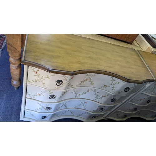 133 - A pair of modern floral painted chests of four drawers, 80cm h x 88cm w
Location: RAB

If there is n... 