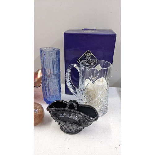 141 - A Poole pottery purse vase in the gemstones pattern, together with mixed glassware to include paperw... 