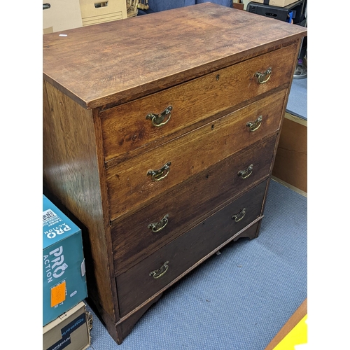 151 - An Arts & Crafts oak chest of four graduating drawers and on bracket shaped feet 106cm h x 92cm w Lo... 