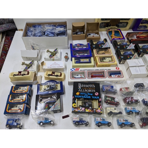 164 - A large collection of Diecast model vans to include a collection of Boots promotional Lledo Days Gon... 