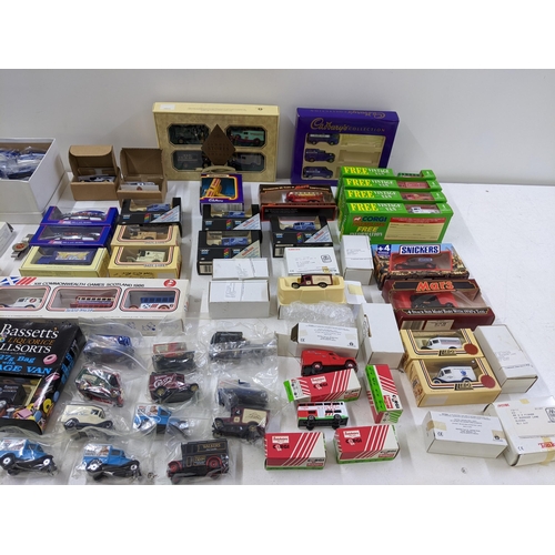 164 - A large collection of Diecast model vans to include a collection of Boots promotional Lledo Days Gon... 