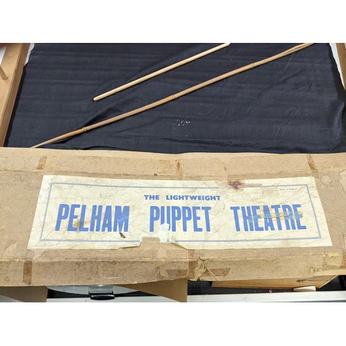 165 - A collection of Pelham Puppets to include S M Witch, Cat, Wolf, and others, as well as a boxed Light... 