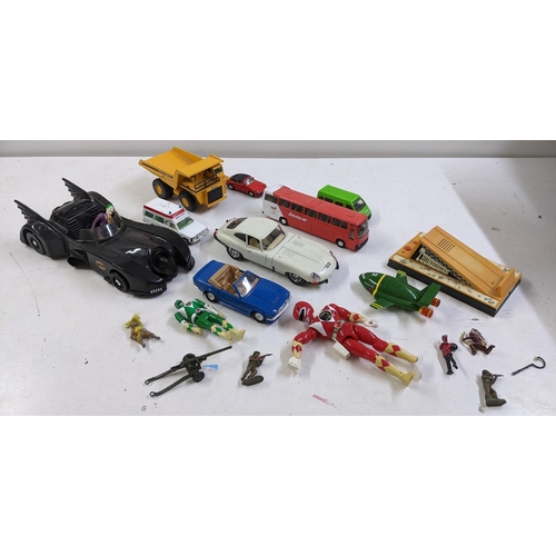 169 - A collection of unboxed toys and Diecast vehicles to include Thunderbirds figures by Matchbox, Power... 