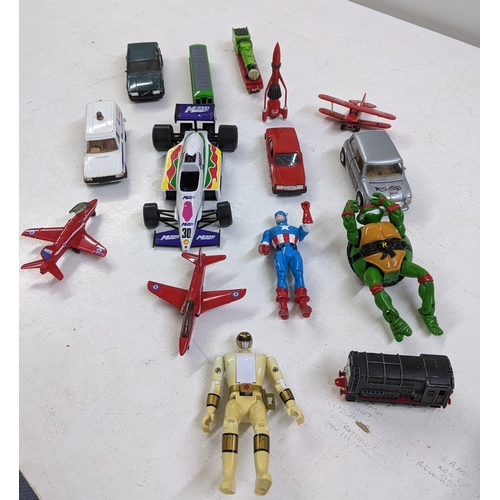 169 - A collection of unboxed toys and Diecast vehicles to include Thunderbirds figures by Matchbox, Power... 