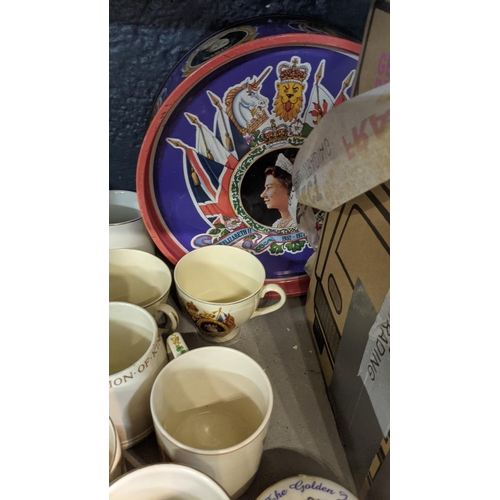 177 - Commemorative ceramics to include mainly mugs, tankards, tins and a figure Location:3.3
 If there is... 