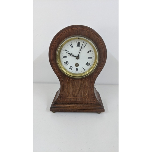 182 - An Edwardian inlaid mahogany balloon clock
Location:1.2

If there is no condition report shown, plea... 