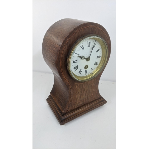 182 - An Edwardian inlaid mahogany balloon clock
Location:1.2

If there is no condition report shown, plea... 