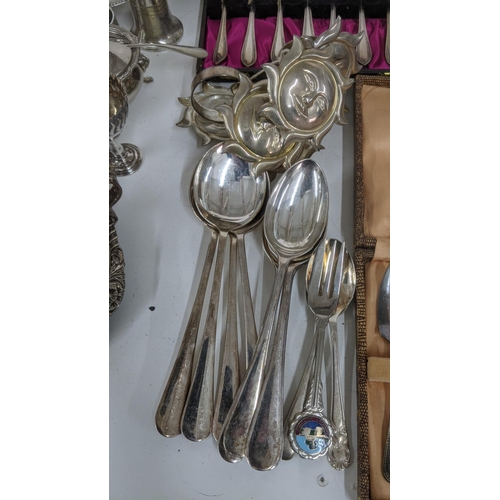 194 - Silver plate to include a Victorian chamberstick, flatware,  and other items Location:RAB
If there i... 