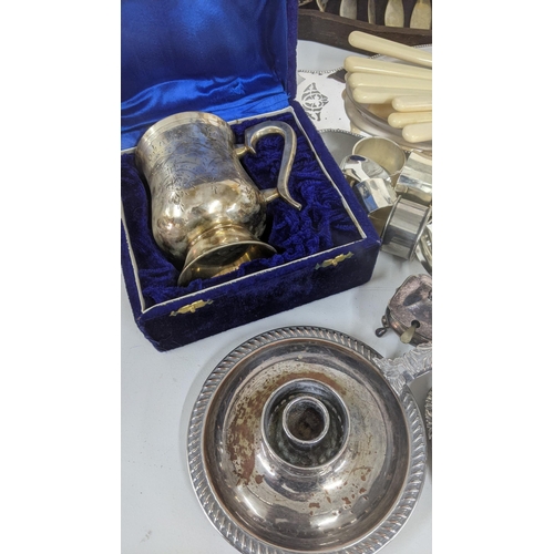 194 - Silver plate to include a Victorian chamberstick, flatware,  and other items Location:RAB
If there i... 