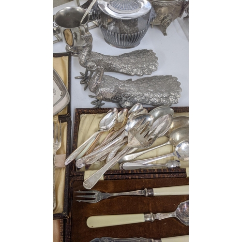 194 - Silver plate to include a Victorian chamberstick, flatware,  and other items Location:RAB
If there i... 