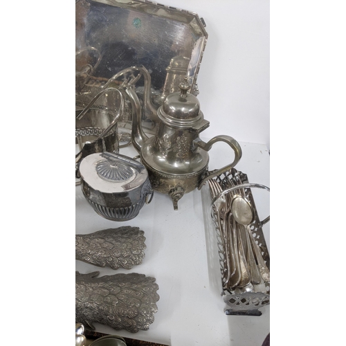 194 - Silver plate to include a Victorian chamberstick, flatware,  and other items Location:RAB
If there i... 