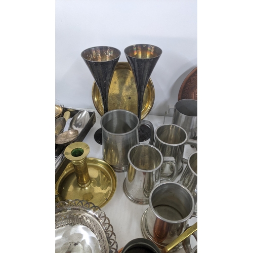 195 - Metalware to include tankards, cutlery (3), Samovar, vases, a sewing machine, and others Location: A... 