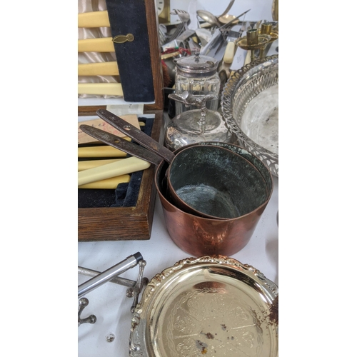 195 - Metalware to include tankards, cutlery (3), Samovar, vases, a sewing machine, and others Location: A... 