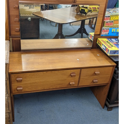 196 - A mid 20th century Stag teak dressing table designed by John & Sylvia Reid 126cm h x 118cm w Locatio... 