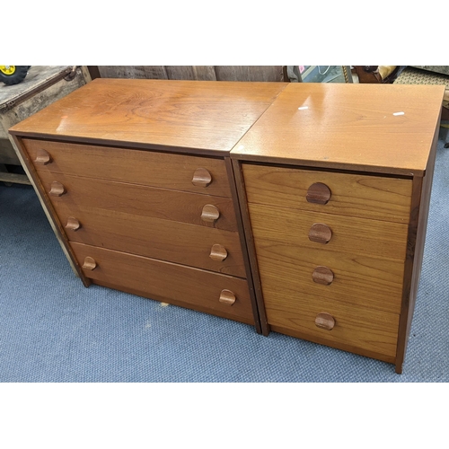 199 - A mid 20th century Stag teak chest of drawers 69cm h x 77cm w, and a matching bedside table 69cm h x... 