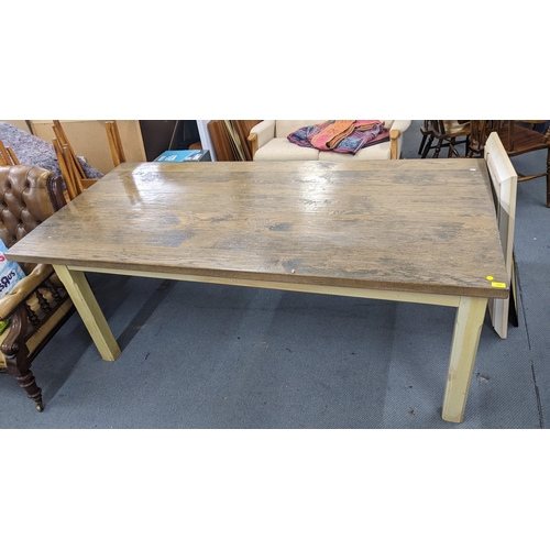 202 - A modern oak rectangular topped dining table on painted leg, 77cm h x 206cm w
Location:A3B

If there... 