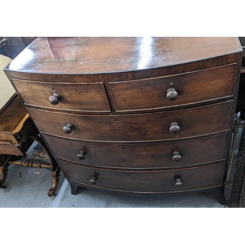 260 - An early 19th century mahogany bow fronted chest of two short and three long drawers, 107cm h x 107c... 