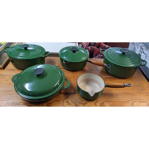 323 - A collection of Le Creuset green cooking pots
Location:DH

If there is no condition report shown, pl... 