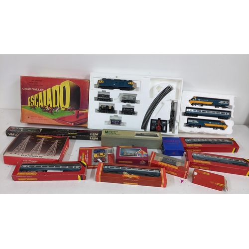 329 - Mixed boxed toys to include Chad Valley Escalado, Millholme model unbuilt train various Hornby 00 ga... 