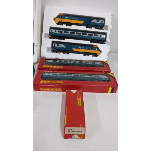 329 - Mixed boxed toys to include Chad Valley Escalado, Millholme model unbuilt train various Hornby 00 ga... 