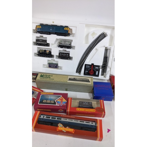 329 - Mixed boxed toys to include Chad Valley Escalado, Millholme model unbuilt train various Hornby 00 ga... 