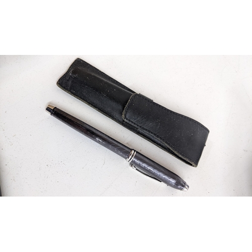 330 - A cross fountain pen with an engine turned case and an 18ct white and yellow gold nib
Location:CAB

... 