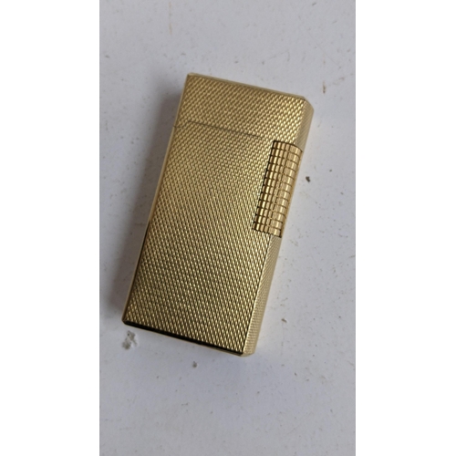 331 - A Dunhill 70 gold plated lighter with flints and fitted box, together with a fountain pen
Location:C... 