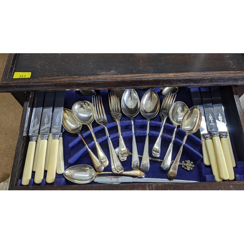 351 - A 1930's oak three tier trolley, with drawer inset with silver plated cutlery
Location:RAB

If there... 