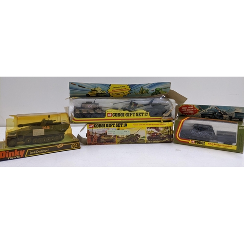 60 - Boxed Diecast military vehicles to include a Dinky Toys No.694 Tank Destroyer, a Corgi gift set 10, ... 