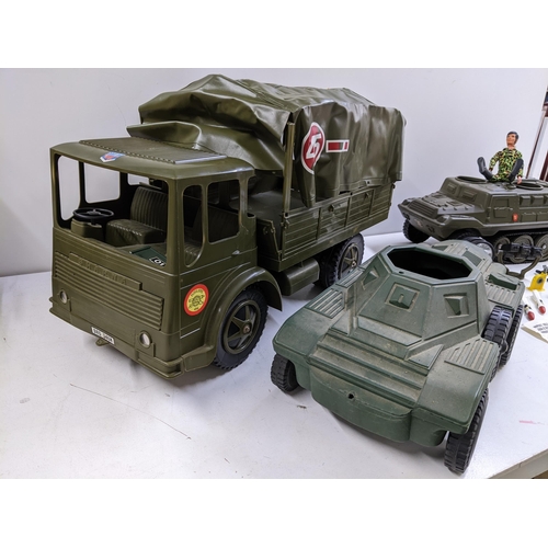 67 - Three military toy vehicles to include a Sharna Toys Leyland Truck with cover, an Irwin military veh... 