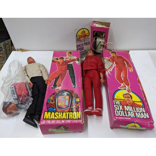 68 - The Six Million Dollar man boxed figurine of Colonel Steve Austin, a boxed figurine of Maskatron, an... 