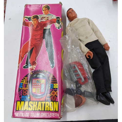 68 - The Six Million Dollar man boxed figurine of Colonel Steve Austin, a boxed figurine of Maskatron, an... 