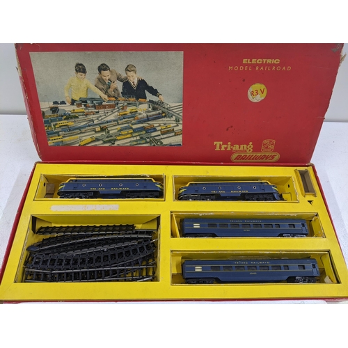 84 - Two 00 gauge model railway sets to include a Triang electric model railway with original box and pac... 