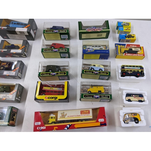 98 - A collection of 25 boxed Corgi Diecast vehicles to include a Corgi Classics Royal Mail Morris minor ... 