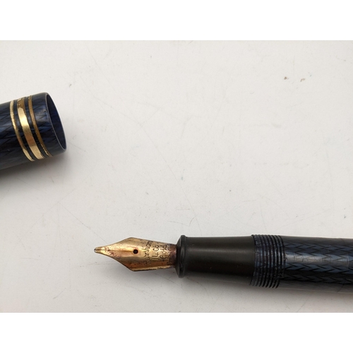 115 - A Conway Stewart no 77 fountain pen with 14ct gold nib in a lady Sheaffer case 
Location: CAB2