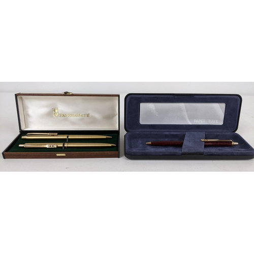 121 - A gold plated Papermate pen and pencil boxed set, and a boxed enamel Papermate ballpoint pen with re... 