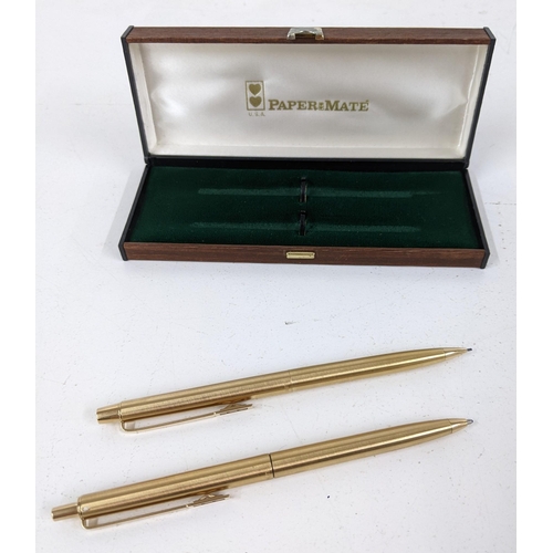 121 - A gold plated Papermate pen and pencil boxed set, and a boxed enamel Papermate ballpoint pen with re... 